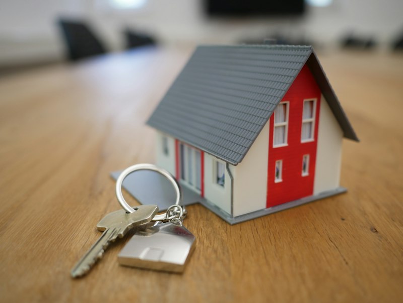 Home buyer receiving keys after successful inspection